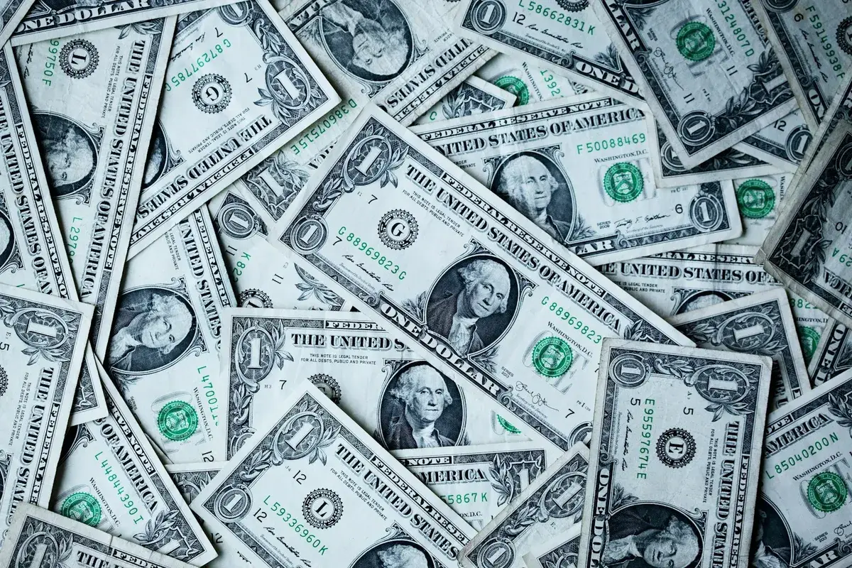 US dollar banknotes in a range of denominations