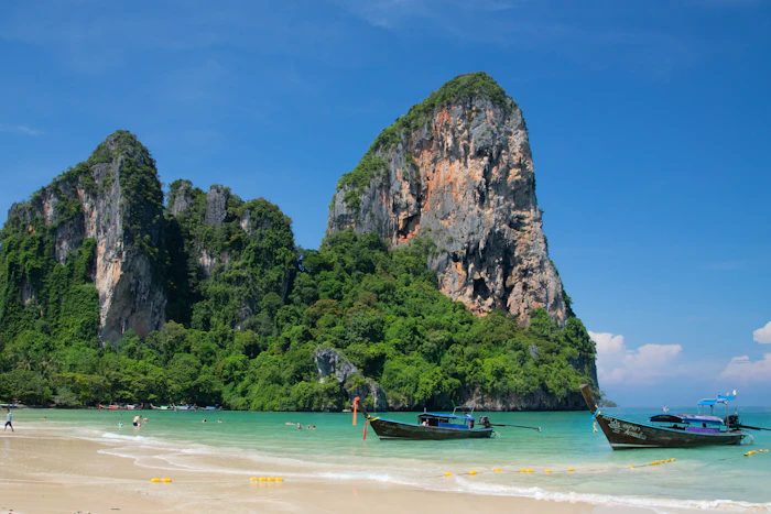 Krabi - Railay's limestone cliffs, longtail boats and Ao Nang