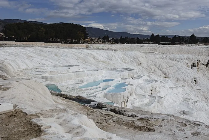 Pamukkale - White travertine terraces above ancient Hierapolis