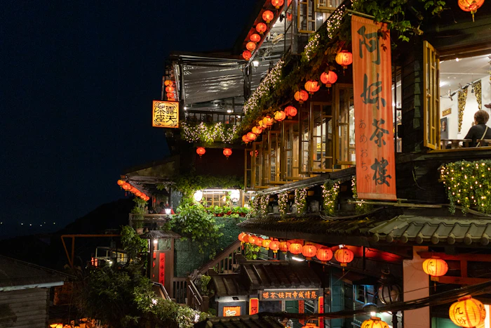 Jiufen - Red lanterns on a hillside above the sea